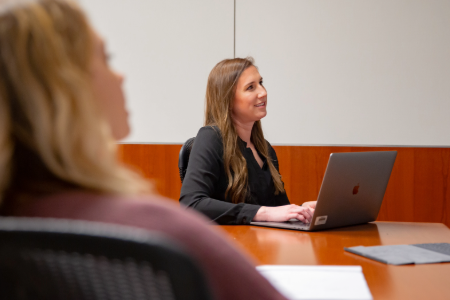 Women on laptop in a training