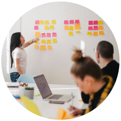 Woman leading a design session with a team